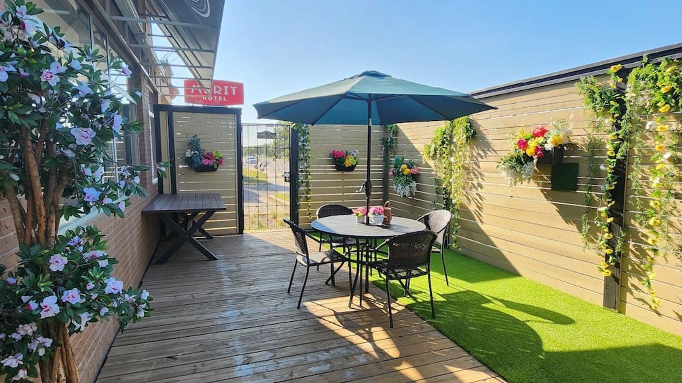 Merit Hotel & Suites